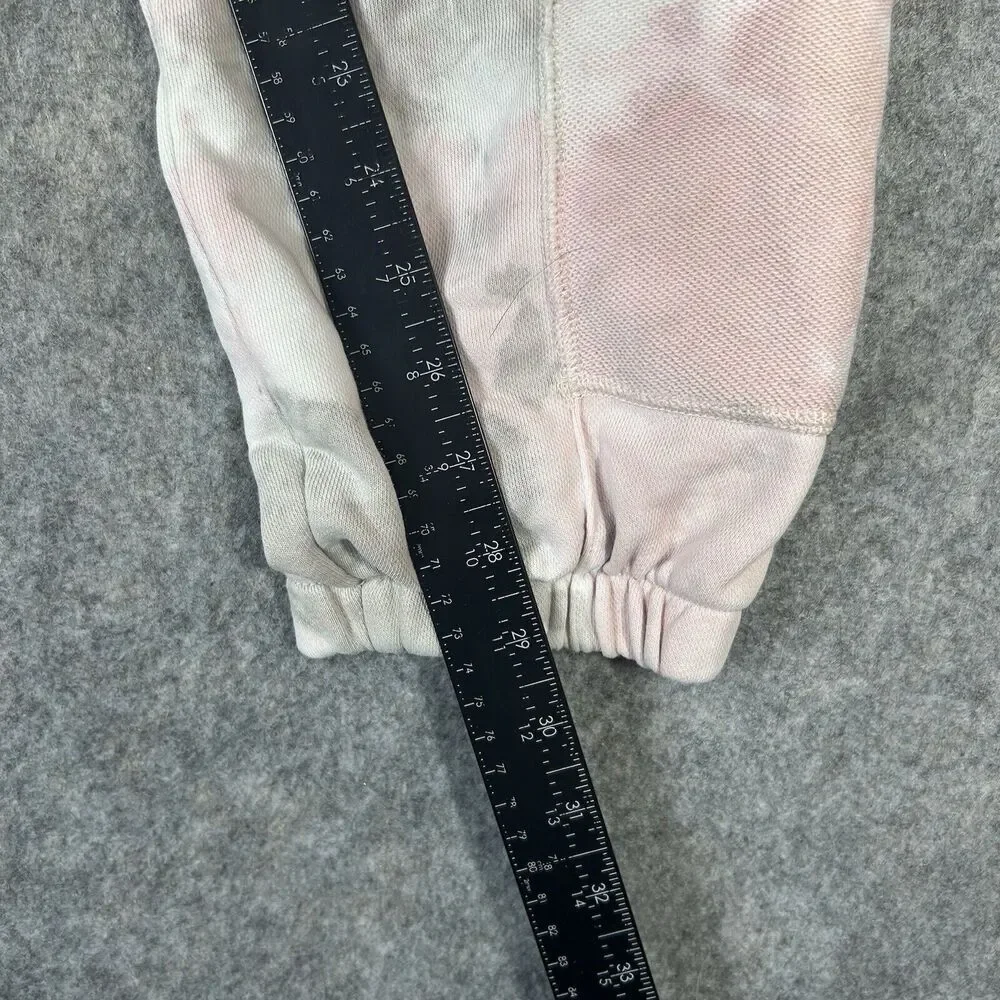 Nike Women's Tie-Dye Track Pants in Light Pink and Gray